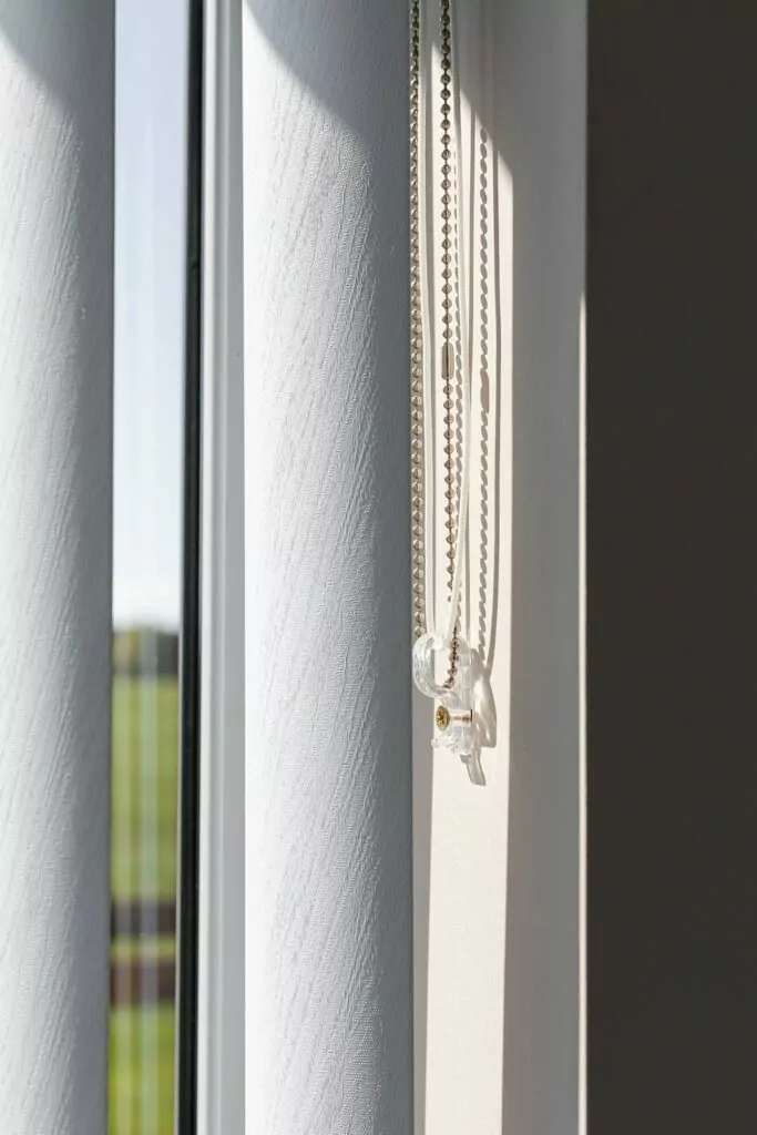 vertical blinds close up with control chain