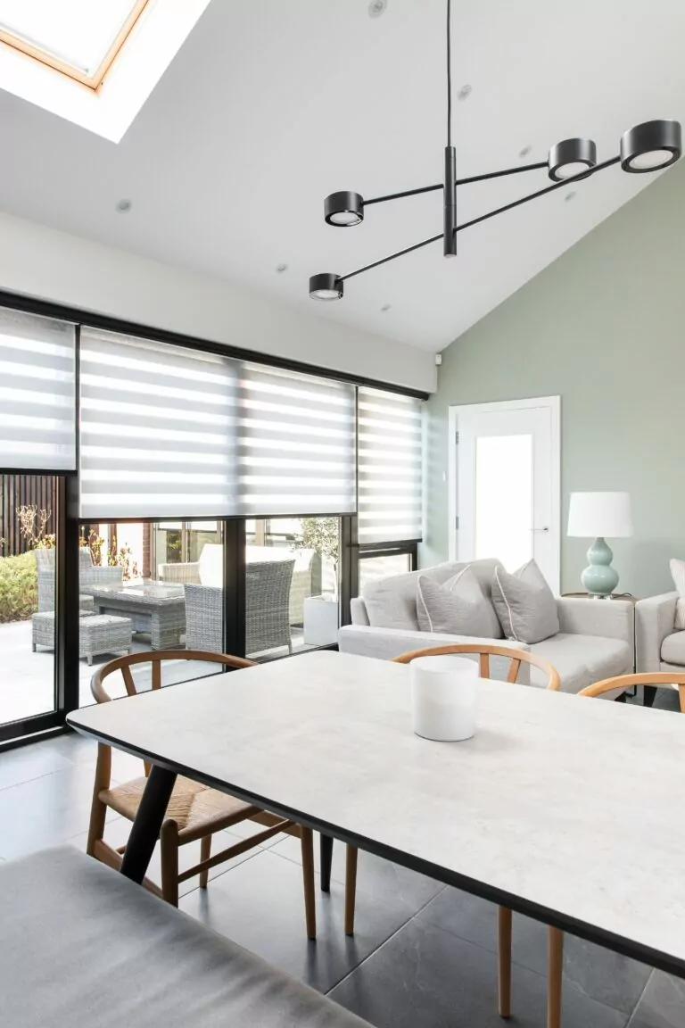 aura blinds tiered on window in living and dining room