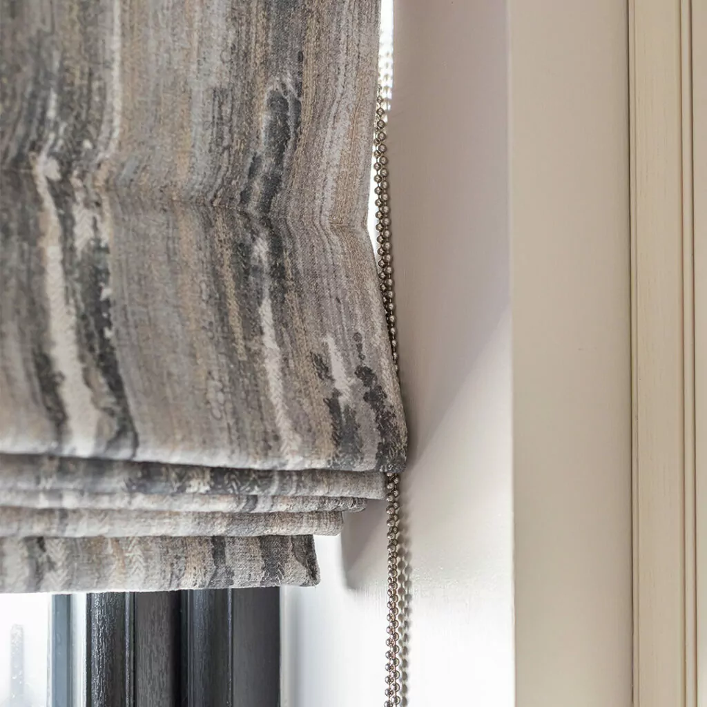 Roman blinds which can help control temperature in a new home