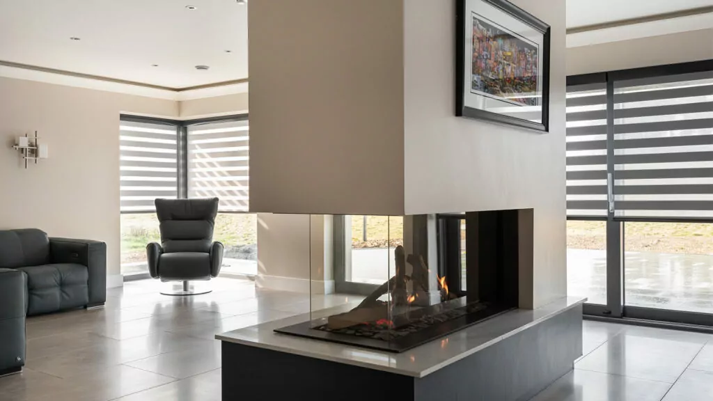 self build modern aura blinds in a contemporary living room with fireplace in Northern Ireland