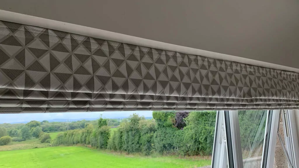 A Thermal Roman Blind that provides insulation over the window