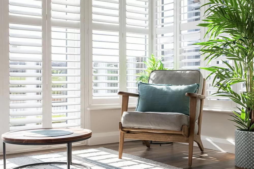 Window Shutter Prices in Northern Ireland Village Blinds and Shutters Full Height Shutters in a contemporary Lounge