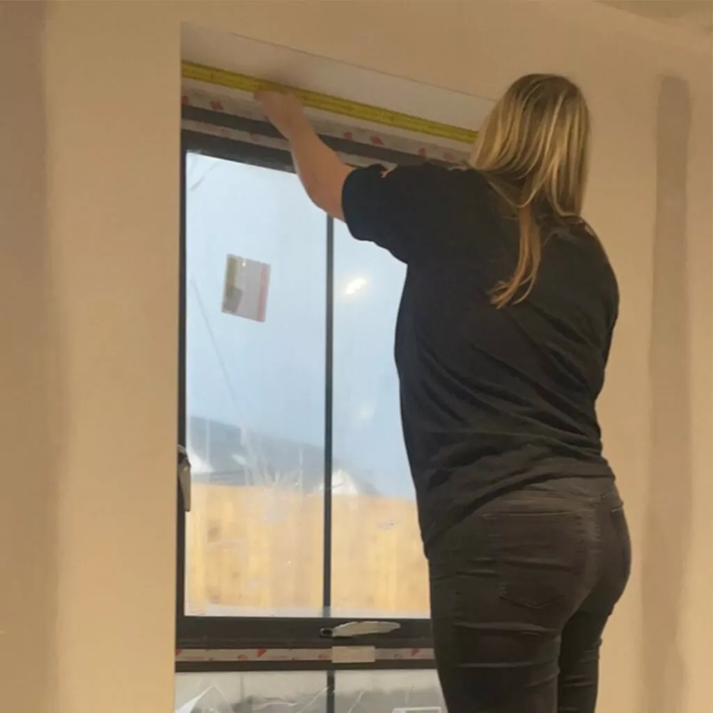 Measuring a wooden blind in Northern Ireland