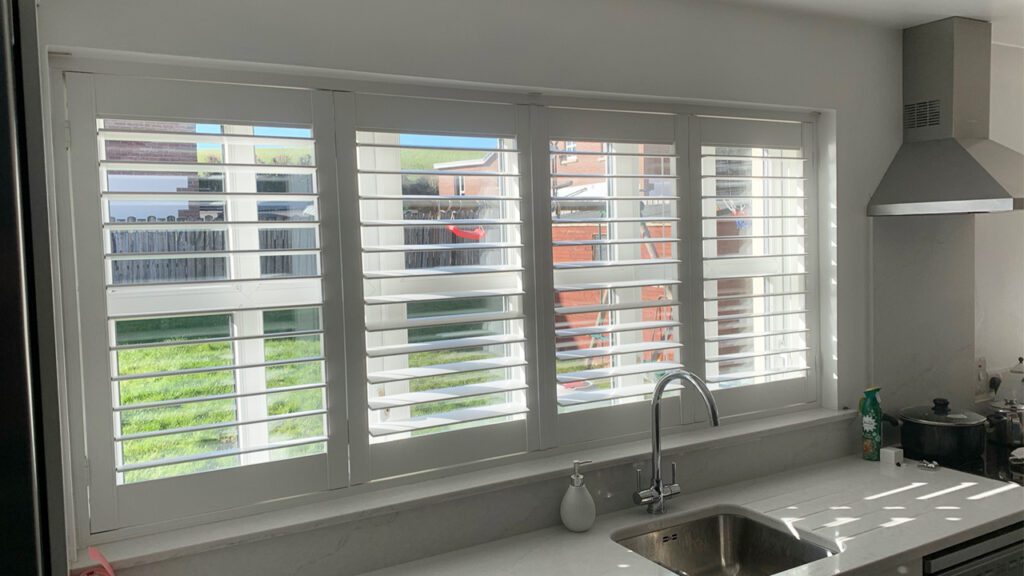 should all windows have shutters example in a white modern kitchen plantation shutter